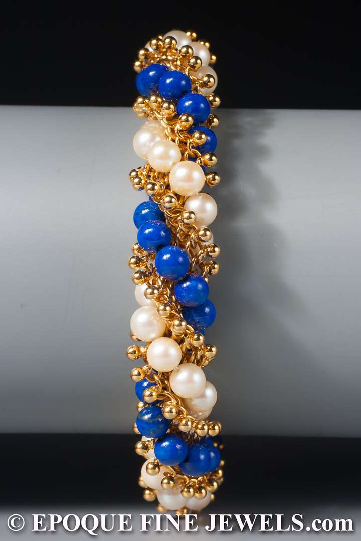 An 18 karat gold, pearl and lapis torsade bracelet